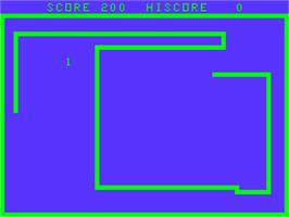 In game image of Snake on the Acorn Atom.
