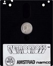 Cartridge artwork for Metro-Cross on the Amstrad CPC.