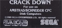 Top of cartridge artwork for Crack Down on the Amstrad CPC.