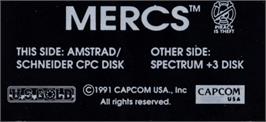Top of cartridge artwork for Mercs on the Amstrad CPC.