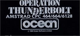 Top of cartridge artwork for Operation Thunderbolt on the Amstrad CPC.