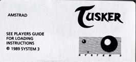 Top of cartridge artwork for Tusker on the Amstrad CPC.