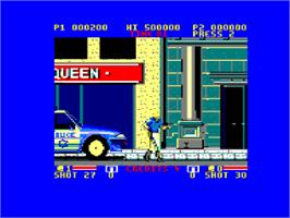In game image of E-SWAT: Cyber Police on the Amstrad CPC.