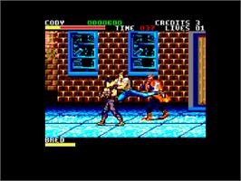In game image of Final Fight on the Amstrad CPC.