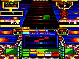 In game image of Klax on the Amstrad CPC.