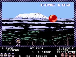 In game image of Pang on the Amstrad CPC.