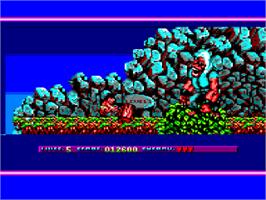 In game image of Prehistorik 2 on the Amstrad CPC.
