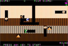 In game image of Dig Dug on the Apple II.