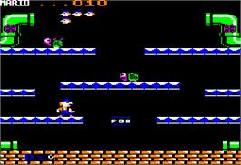 In game image of Mario Bros. on the Apple II.