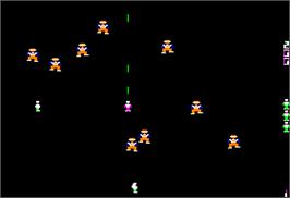 In game image of Robotron on the Apple II.