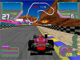 In game image of Ace Driver: Victory Lap on the Arcade.