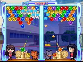 In game image of Azumanga Daioh Puzzle Bobble on the Arcade.