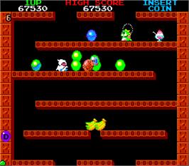In game image of Bubble Bobble on the Arcade.