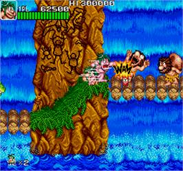 In game image of Caveman Ninja on the Arcade.