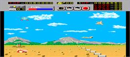 In game image of Choplifter on the Arcade.