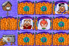 In game image of Fred Flintstones' Memory Match on the Arcade.