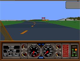 In game image of Hard Drivin' on the Arcade.