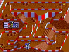 In game image of Ironman Ivan Stewart's Super Off-Road on the Arcade.