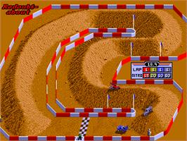 In game image of Ironman Ivan Stewart's Super Off-Road Track-Pak on the Arcade.