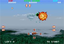 In game image of Mega Blast on the Arcade.