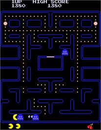 In game image of PuckMan on the Arcade.