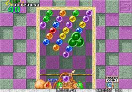 In game image of Puzzle Bobble / Bust-A-Move on the Arcade.
