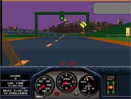 In game image of Race Drivin' on the Arcade.