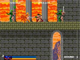 In game image of Rastan Saga on the Arcade.