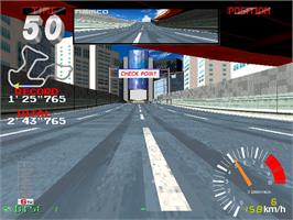 In game image of Ridge Racer 2 on the Arcade.