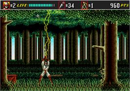 In game image of Shinobi III on the Arcade.