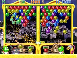 In game image of Super Puzzle Bobble on the Arcade.