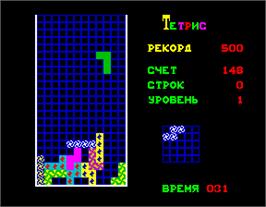 In game image of Tetris on the Arcade.