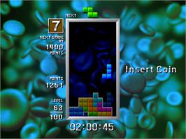 In game image of Tetris The Grand Master on the Arcade.