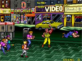 In game image of The Combatribes on the Arcade.