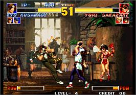 In game image of The King of Fighters '95 on the Arcade.