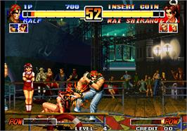 In game image of The King of Fighters '96 on the Arcade.