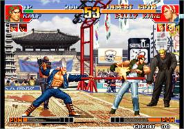 In game image of The King of Fighters '97 on the Arcade.