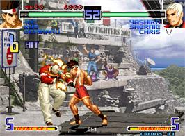 In game image of The King of Fighters 2002 Plus on the Arcade.