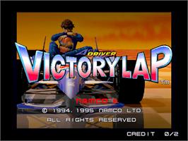 Title screen of Ace Driver: Victory Lap on the Arcade.