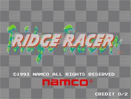 Title screen of Ridge Racer on the Arcade.