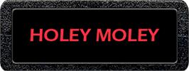 Top of cartridge artwork for Holey Moley on the Atari 2600.