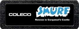 Top of cartridge artwork for Smurf: Rescue in Gargamel's Castle on the Atari 2600.