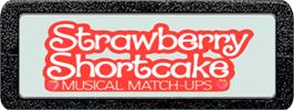 Top of cartridge artwork for Strawberry Shortcake Musical Match-Ups on the Atari 2600.