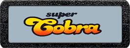 Top of cartridge artwork for Super Cobra on the Atari 2600.