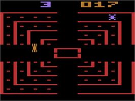In game image of Dodge 'Em on the Atari 2600.