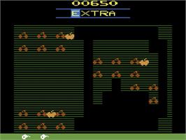 In game image of Mr. Do! on the Atari 2600.