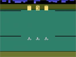 In game image of Oscar's Trash Race on the Atari 2600.