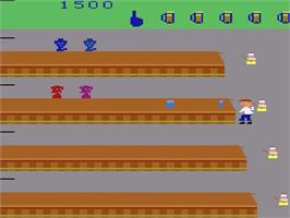In game image of Tapper on the Atari 2600.