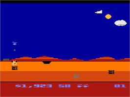 In game image of Chopper Hunt on the Atari 8-bit.