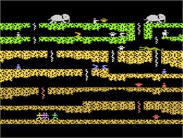 In game image of Floyd of the Jungle on the Atari 8-bit.